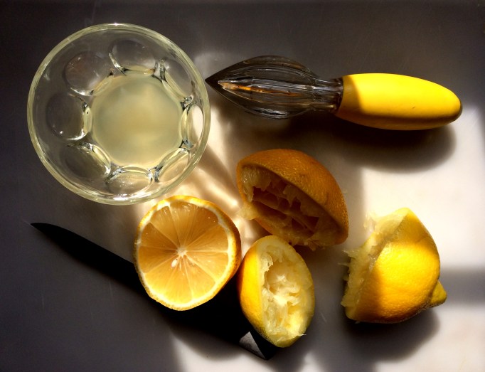 Juiced lemons for homemade ricotta